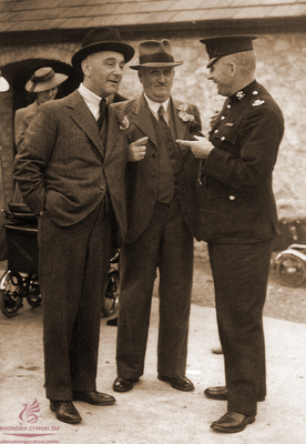 W.M. Llewellyn with a policeman